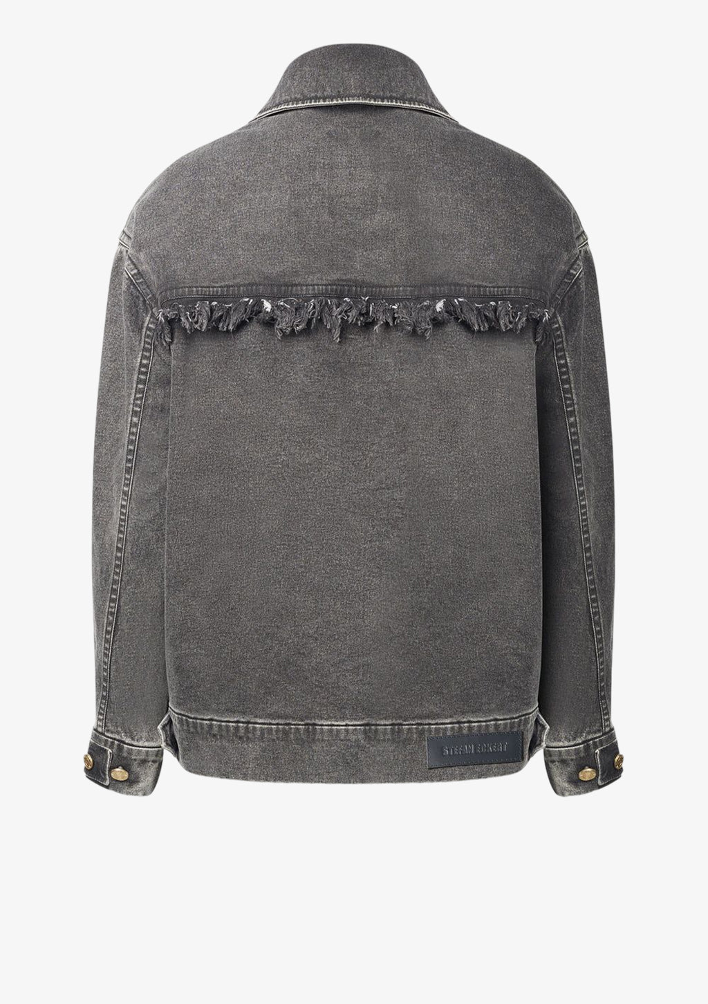 Monogram Oversize Jeansjacke mit Fransen für Damen in schwarz von Designer Stefan Eckert. Erhältlich in Hamburg, London, New York, London und Paris. Fringed denim jacket for women in black by designer Stefan Eckert. Available in Hamburg, London, New York, London and Paris.