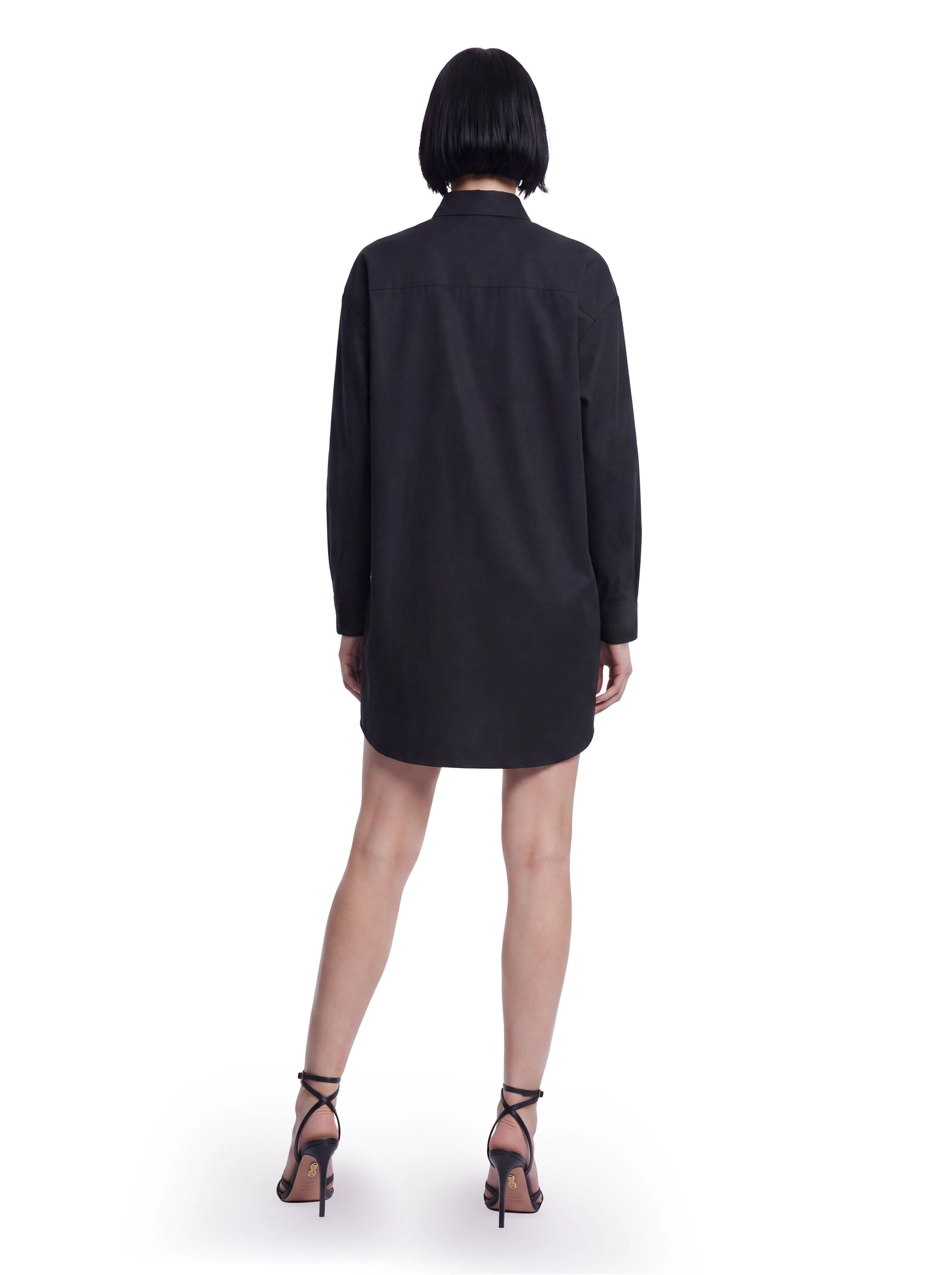 Luxus Designer Hemdkleid für Damen aus schwarzer Baumwolle mit locker geschnittener Silhouette, langen Ärmeln und klassischem Hemdkragen.