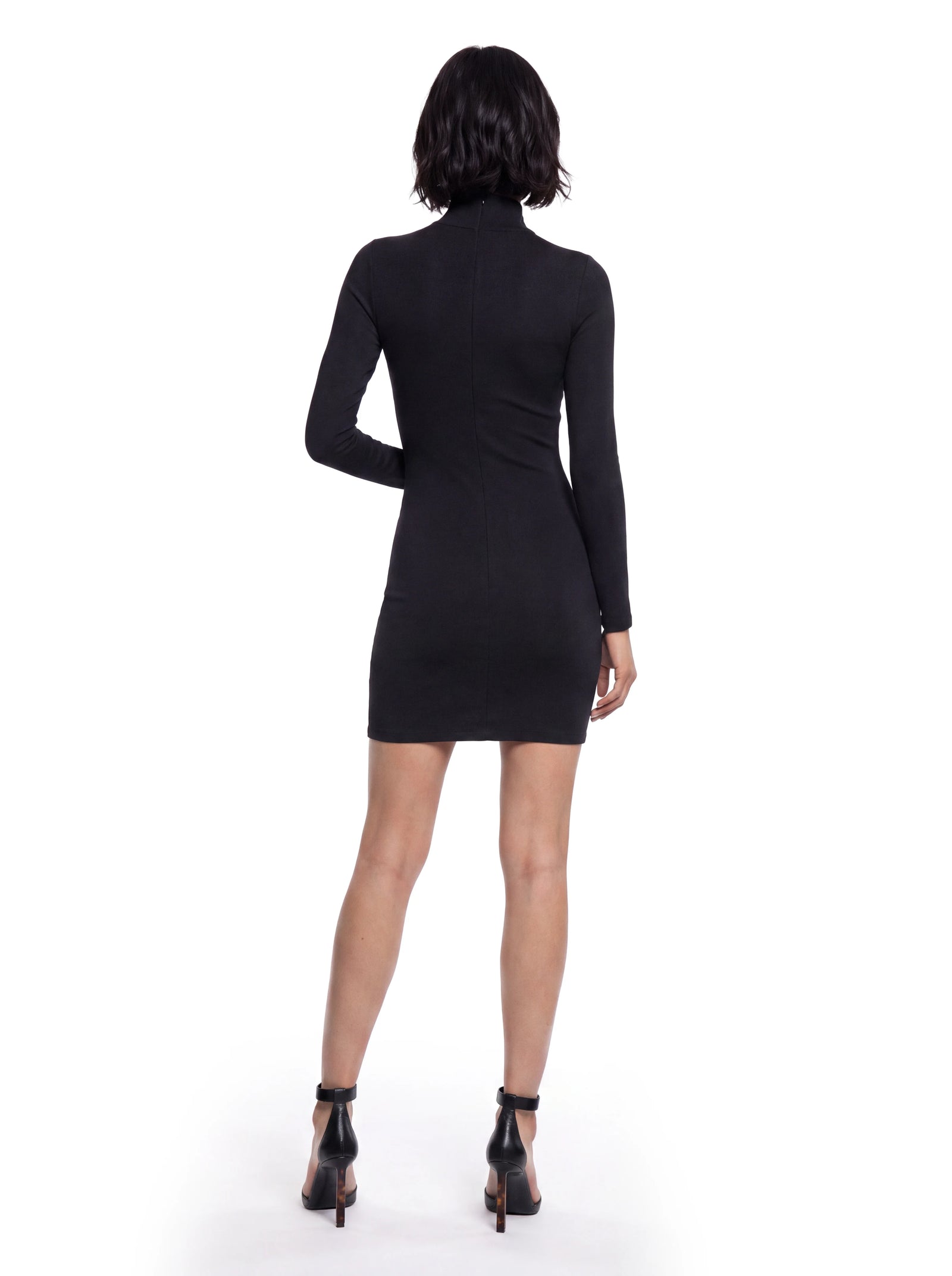 Luxus Designer Kleid für Damen aus Merinowolle in Schwarz mit elegantem Rollkragen, langen Ärmeln und figurbetonter Silhouette in zeitlosem Design.