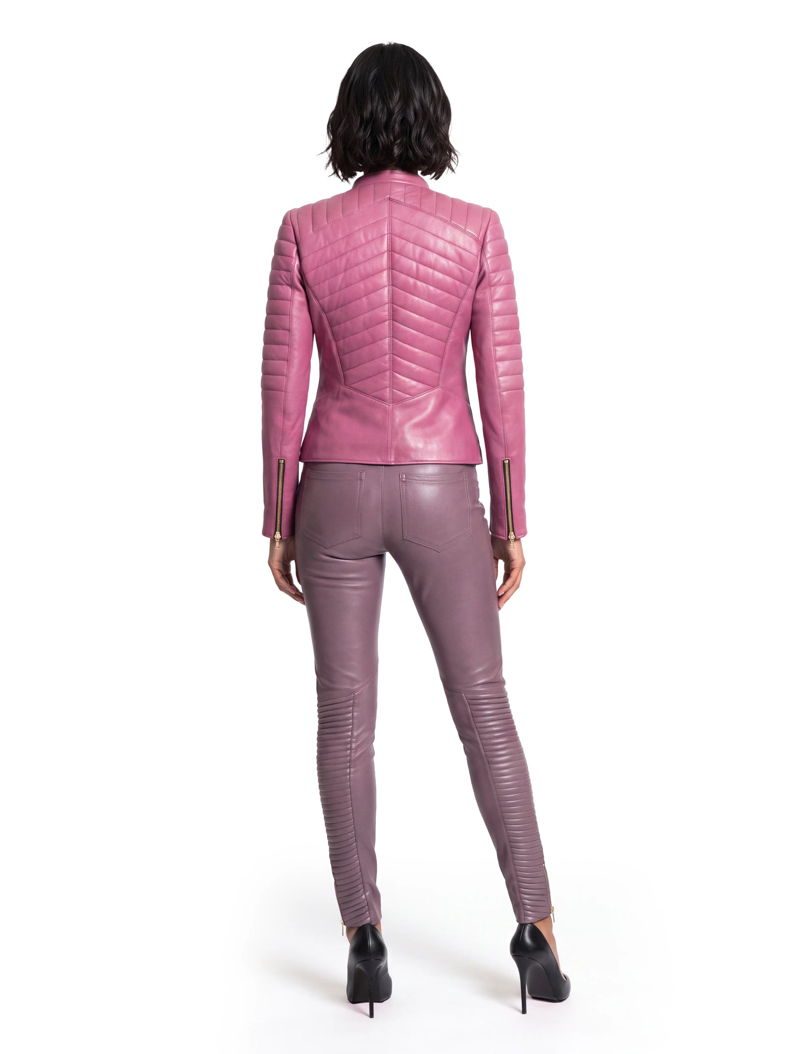Pinke Luxus Designer Lederjacke in der Rückansicht mit taillierter Silhouette und geometrisch angeordneten Steppdetails an Rücken, Schultern und Ärmeln.