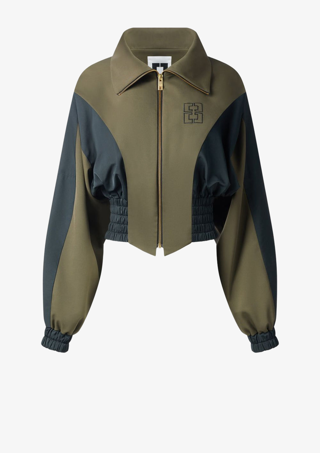 Cropped Windbreaker für Damen in khaki und schwarz von Designer Stefan Eckert. Erhältlich in Hamburg, London, New York, London und Paris. Windbreaker for women in khaki and black by designer Stefan Eckert. Available in Hamburg, London, New York, London and Paris.